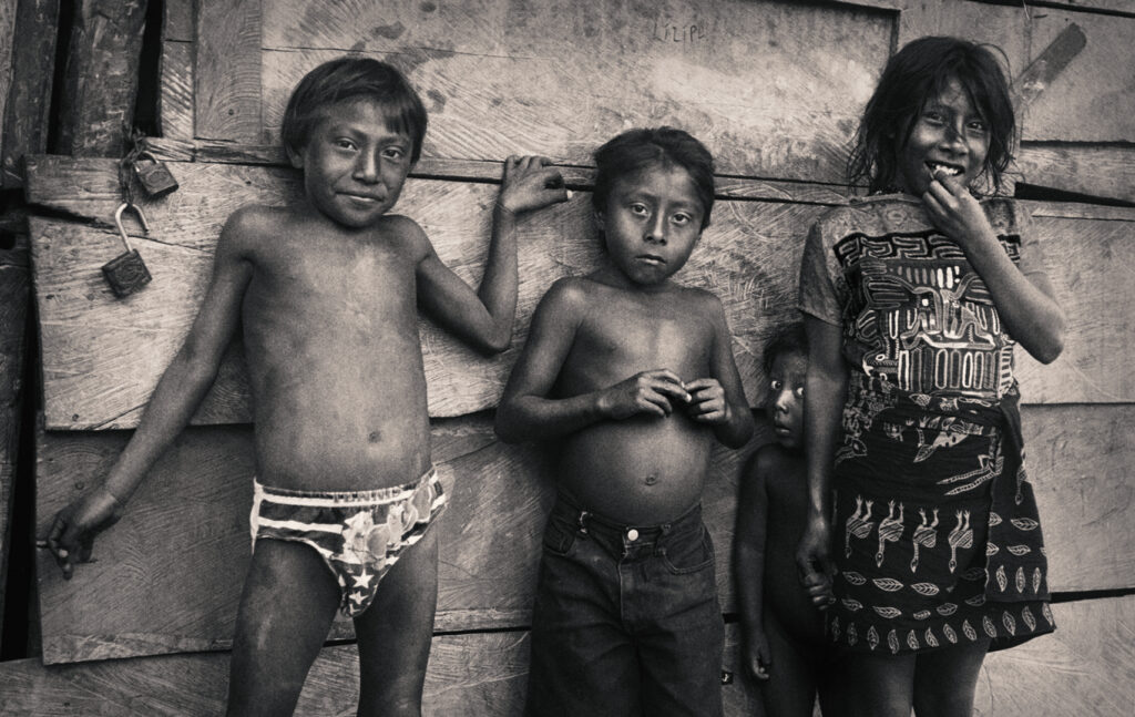 hildren of Darién standing still beneath the jungle light — a moment of innocence before history arrived.