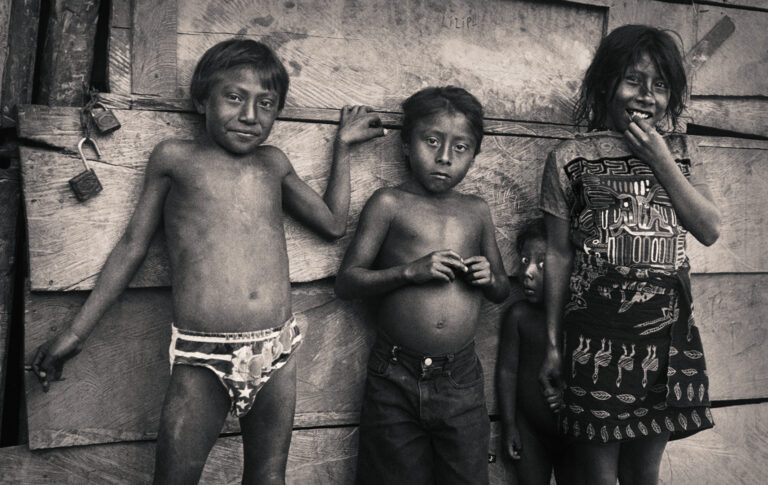 hildren of Darién standing still beneath the jungle light — a moment of innocence before history arrived.